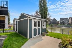 The backyard comes completed with a shed - 