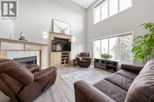 9 Hidden Valley Crescent Nw, Calgary, AB - Indoor Photo Showing Living Room With Fireplace