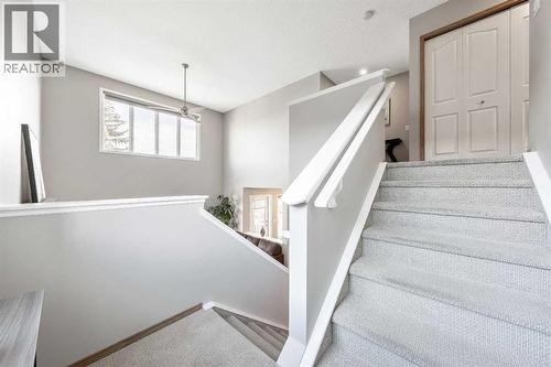 Stair Case to 2nd Level - 9 Hidden Valley Crescent Nw, Calgary, AB - Indoor Photo Showing Other Room