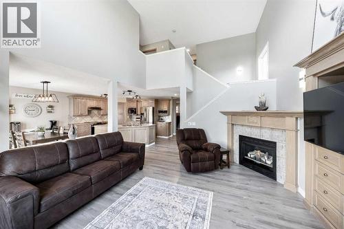 9 Hidden Valley Crescent Nw, Calgary, AB - Indoor Photo Showing Living Room With Fireplace