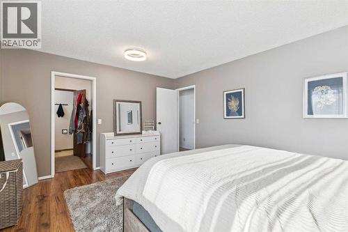 205 Acacia Drive Se, Airdrie, AB - Indoor Photo Showing Bedroom