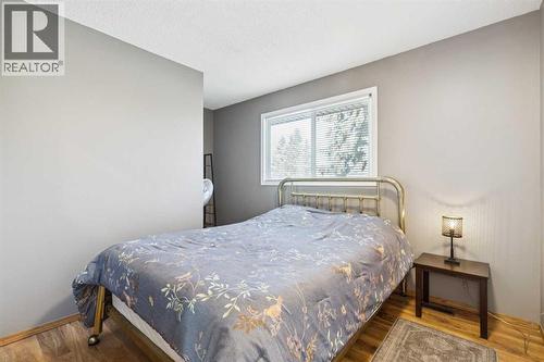 205 Acacia Drive Se, Airdrie, AB - Indoor Photo Showing Bedroom