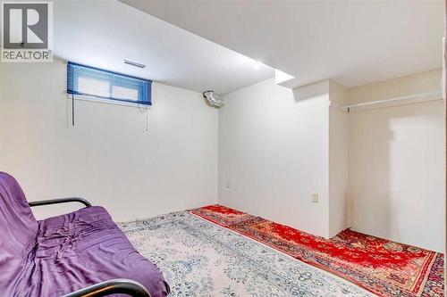 4th bedroom in basement - no egress window - 205 Acacia Drive Se, Airdrie, AB - Indoor Photo Showing Bedroom