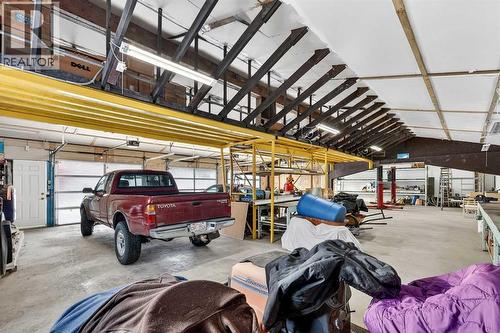33235 Range Road 64, Rural Mountain View County, AB - Indoor Photo Showing Garage