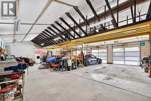 33235 Range Road 64, Rural Mountain View County, AB - Indoor Photo Showing Garage