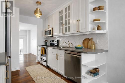 Virtually Staged photo with new fixtures - 101 Halley Street, Ottawa, ON - Indoor Photo Showing Kitchen