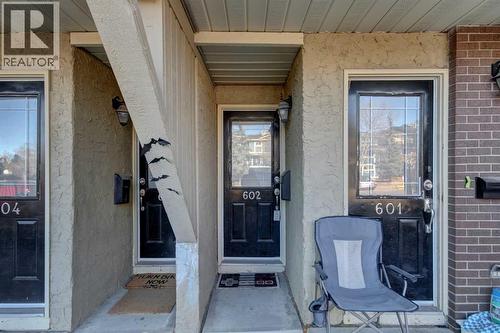 Front door - 602, 2200 Woodview Drive Sw, Calgary, AB - Outdoor With Exterior