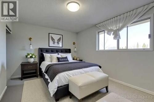 Primary bedroom virtually staged - 602, 2200 Woodview Drive Sw, Calgary, AB - Indoor Photo Showing Bedroom