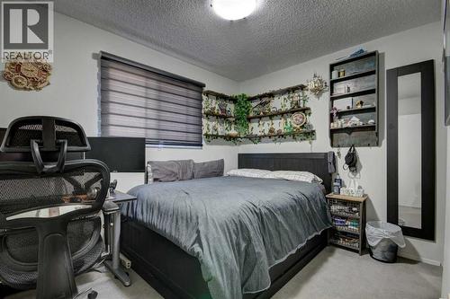 2nd bedroom - 602, 2200 Woodview Drive Sw, Calgary, AB - Indoor Photo Showing Bedroom