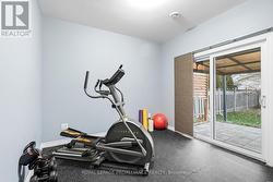 Bedroom #3 or Gym with Walkout to Backyard - 
