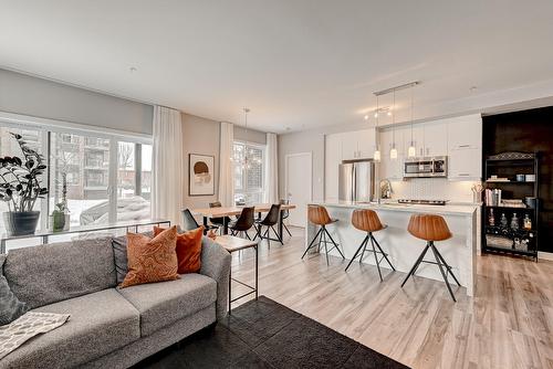 Vue d'ensemble - 104-445 Av. De La Belle-Dame, La Prairie, QC - Indoor Photo Showing Living Room