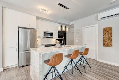 Cuisine - 104-445 Av. De La Belle-Dame, La Prairie, QC - Indoor Photo Showing Kitchen With Upgraded Kitchen