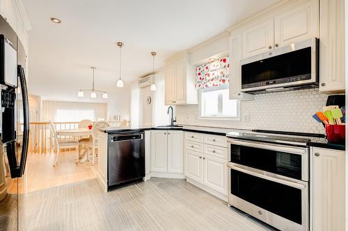 Cuisine - 87 Rue De Caplan, Blainville, QC - Indoor Photo Showing Kitchen With Upgraded Kitchen