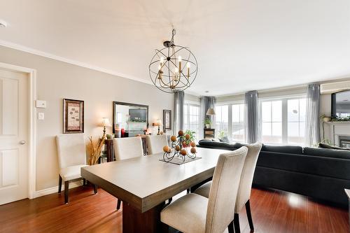 Salle à manger - 3002 Rue Du Sauvignon, Sherbrooke (Les Nations), QC - Indoor Photo Showing Dining Room With Fireplace