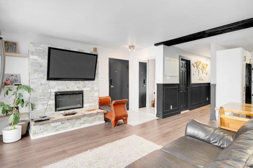 Vue d'ensemble - 6-2079 Rue Schulz, Saint-Jérôme, QC - Indoor Photo Showing Living Room With Fireplace