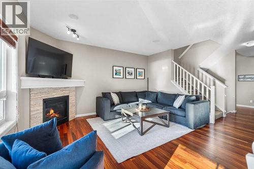 190 Sage Bank Grove Nw, Calgary, AB - Indoor Photo Showing Living Room With Fireplace