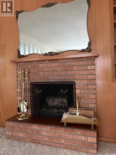 706 Balmoral Street, Saskatoon, SK - Indoor Photo Showing Living Room With Fireplace
