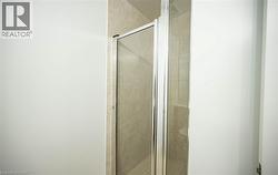 Bathroom with a stall shower - 