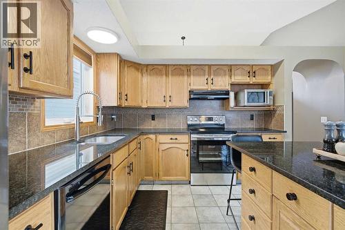 940 Citadel Drive Nw, Calgary, AB - Indoor Photo Showing Kitchen With Stainless Steel Kitchen With Double Sink