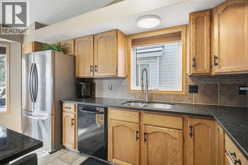 940 Citadel Drive Nw, Calgary, AB - Indoor Photo Showing Kitchen With Double Sink