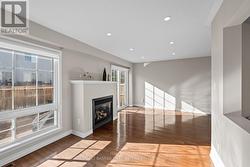 Expansive windows welcome natural light throughout - 