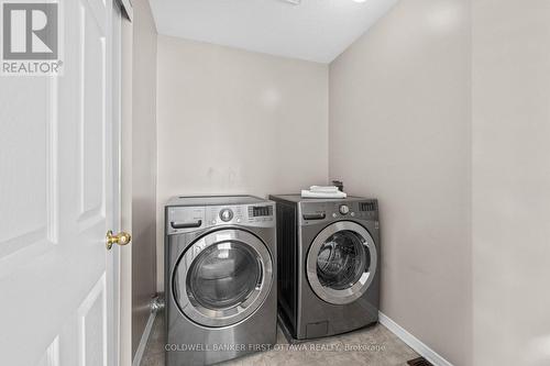 2nd lvl laundry rm w dbl door Lrg storage closet. - 20 Fieldberry Private, Ottawa, ON - Indoor Photo Showing Laundry Room