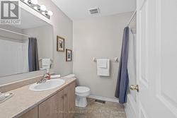 2nd level 4 pc bathroom w shower/tub combo. - 