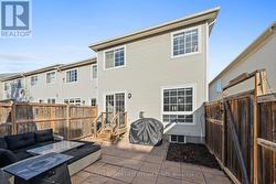 Backyard patio access from the left side of house. - 