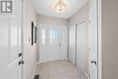 Welcoming, tiled front foyer w closet space. - 20 Fieldberry Private, Ottawa, ON  - Indoor Photo Showing Other Room 