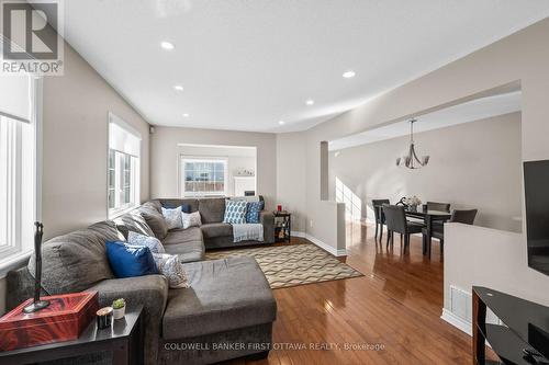 Living room w portrait opening to great room! - 20 Fieldberry Private, Ottawa, ON - Indoor Photo Showing Living Room