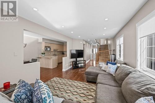 Bright windows and grand space for hosting. - 20 Fieldberry Private, Ottawa, ON - Indoor Photo Showing Living Room