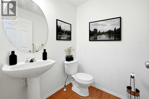 Main Floor Powder room - 132 Royal Birch Mount Nw, Calgary, AB - Indoor Photo Showing Bathroom