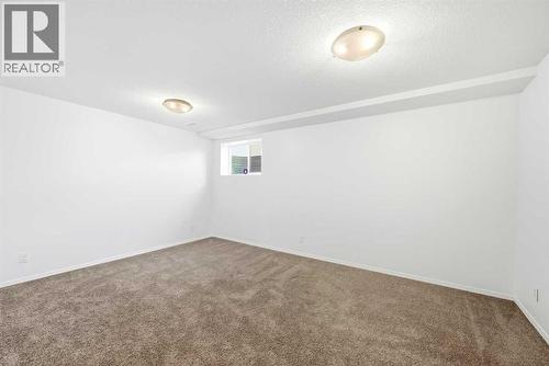 132 Royal Birch Mount Nw, Calgary, AB - Indoor Photo Showing Other Room