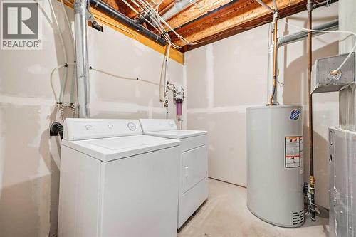 132 Royal Birch Mount Nw, Calgary, AB - Indoor Photo Showing Laundry Room