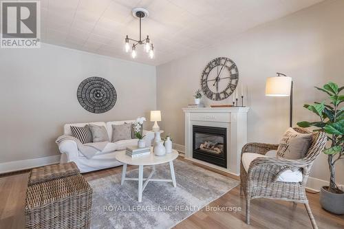 23 Trapnell Street, St. Catharines (E. Chester), ON - Indoor Photo Showing Living Room With Fireplace