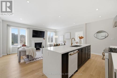 44 Priory Drive, Whitby, ON - Indoor Photo Showing Kitchen With Fireplace With Double Sink
