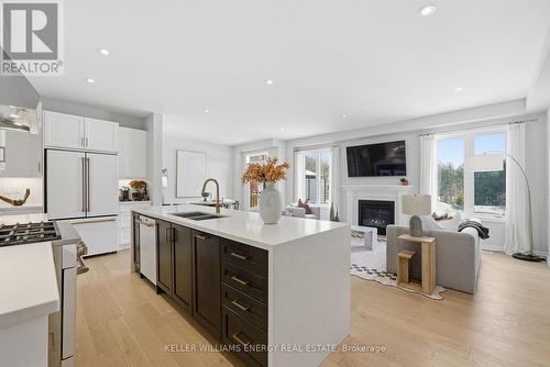 44 Priory Drive, Whitby, ON - Indoor Photo Showing Kitchen With Fireplace With Double Sink With Upgraded Kitchen