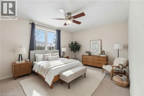 Carpeted bedroom featuring ceiling fan - 28 Mansfield Drive, St. George, ON - Indoor Photo Showing Bedroom