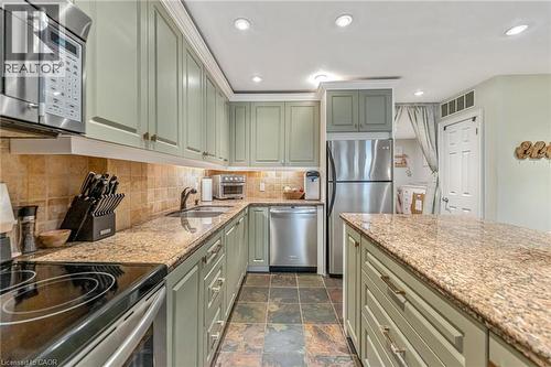 283 King Street E Unit# 304, Hamilton, ON - Indoor Photo Showing Kitchen With Double Sink
