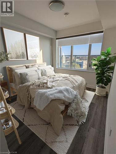virtually staged - 15 Wellington Street S Unit# 407, Kitchener, ON - Indoor Photo Showing Bedroom