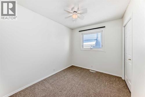 Bedroom 3 - 9875 Hidden Valley Drive Nw, Calgary, AB - Indoor Photo Showing Other Room