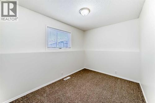 Bedroom 4(on 3rd level) - 9875 Hidden Valley Drive Nw, Calgary, AB - Indoor Photo Showing Other Room