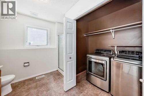 9875 Hidden Valley Drive Nw, Calgary, AB - Indoor Photo Showing Laundry Room