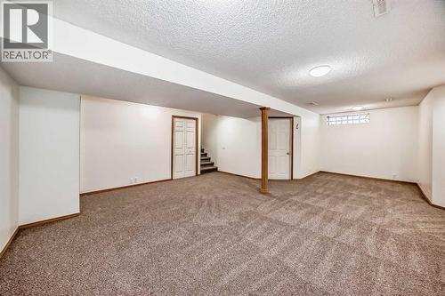 Basement Rec Area - 9875 Hidden Valley Drive Nw, Calgary, AB - Indoor Photo Showing Other Room