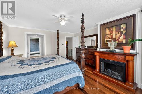 5204 Swiftcurrent Trail, Mississauga, ON - Indoor Photo Showing Bedroom With Fireplace
