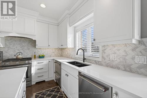 56 Fieldstone Crescent S, Middlesex Centre (Komoka), ON - Indoor Photo Showing Kitchen With Double Sink With Upgraded Kitchen