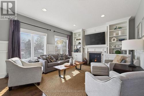 56 Fieldstone Crescent S, Middlesex Centre (Komoka), ON - Indoor Photo Showing Living Room With Fireplace
