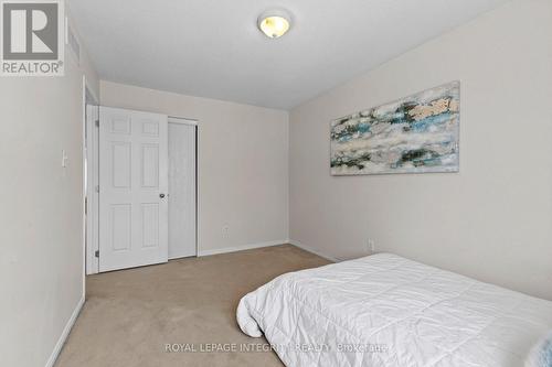 Secondary bedroom reverse angle - 30 Goldthorpe Private, Ottawa, ON - Indoor Photo Showing Bedroom