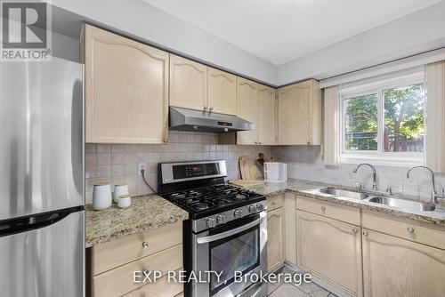 148 Taylorwood Avenue, Caledon, ON - Indoor Photo Showing Kitchen With Double Sink