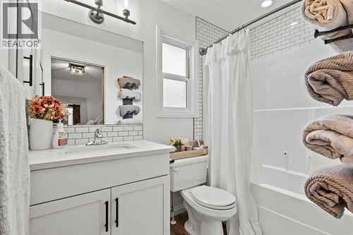 Ensuite to master - 311 Mcleod Crescent, Diamond Valley, AB - Indoor Photo Showing Bathroom